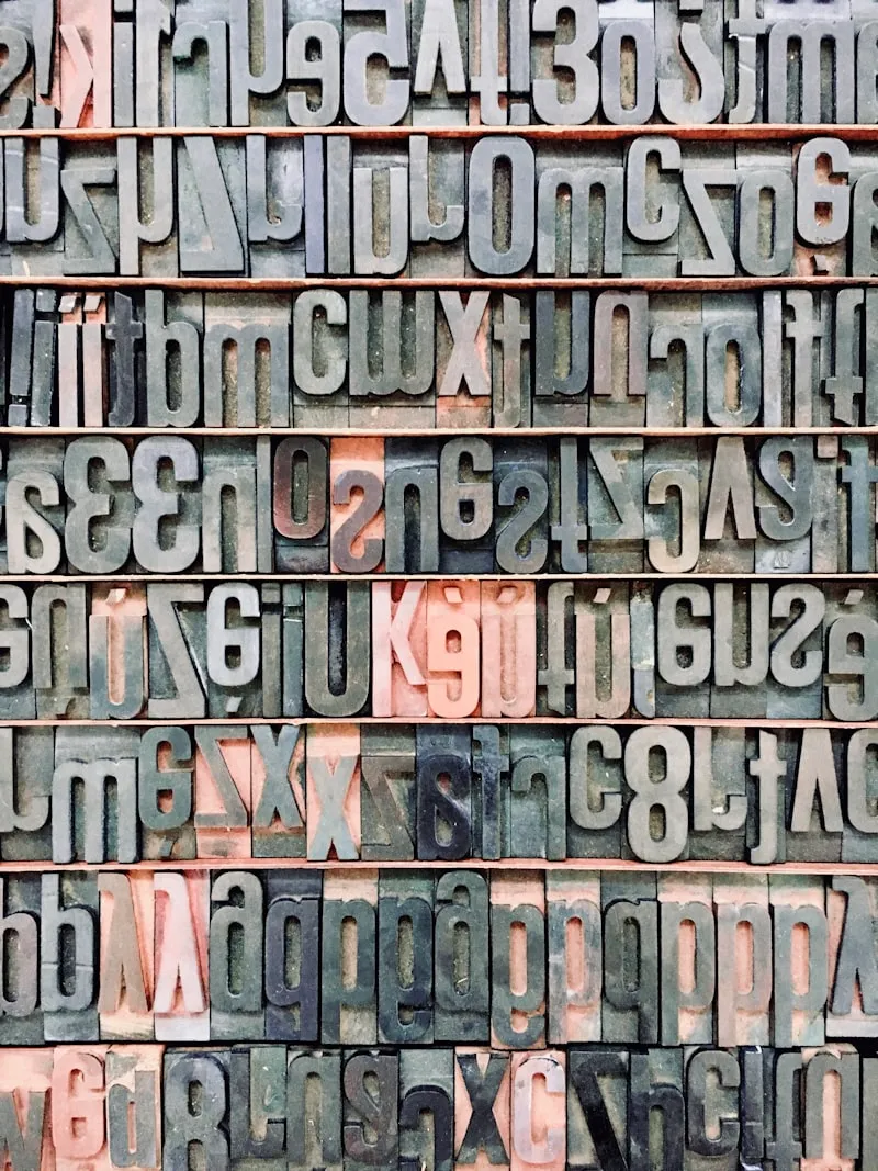 Vintage letterpress type case filled with metal letterforms