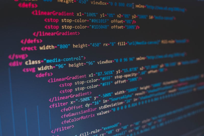 Source code illuminated on a glowing display