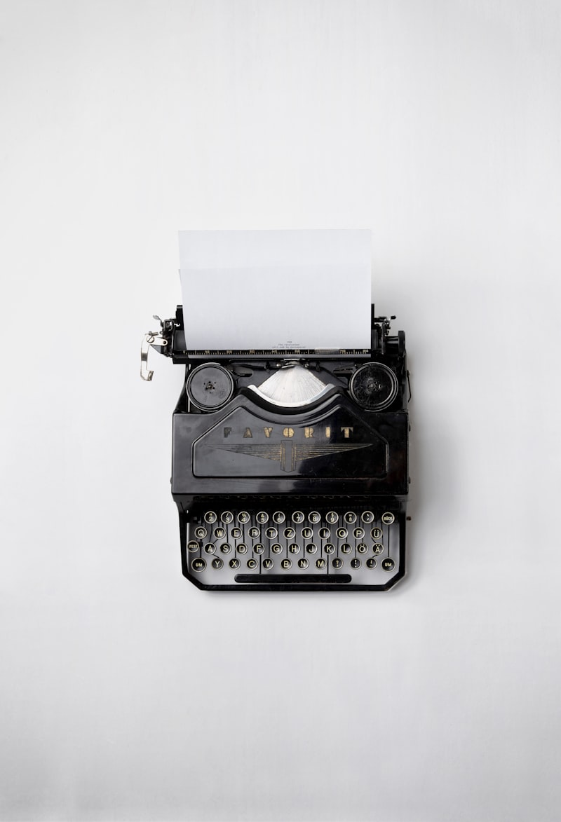 Vintage typewriter with typed page on a wooden desk